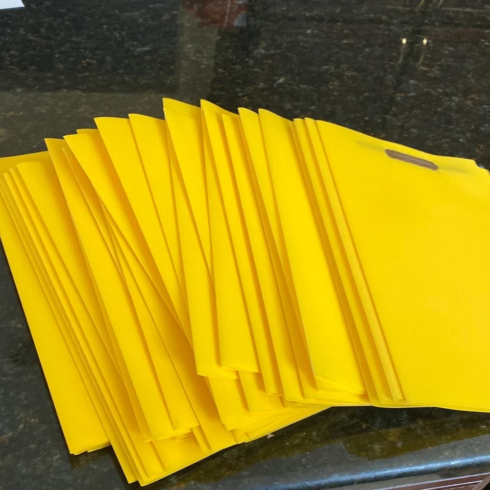 NWOT Bundle of 40 yellow plastic, first cut letter folders with clasps